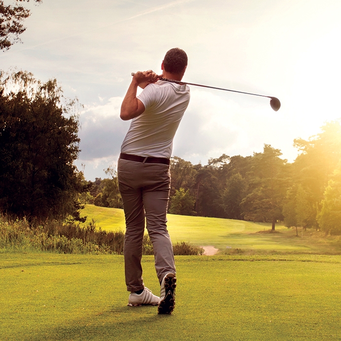 A man teeing off at Muskoka Bay Resort